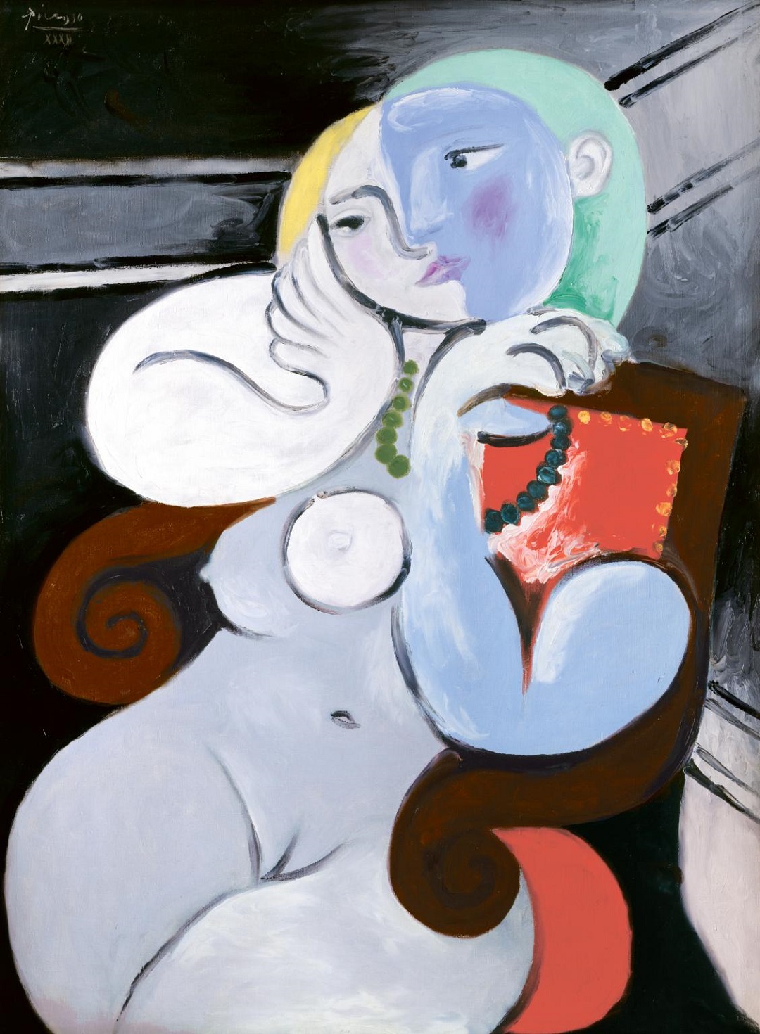 Picasso Female nude sitting in red armchair 1932